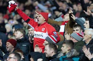 Middlesborough taraftarı 29 Aralık 202 'de Ewood Park, Blackburn, İngiltere' de oynanan Blackburn Rovers-Middlesbrough maçından sonra bunu kutluyor.