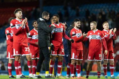 Middlesborough oyuncuları, 29 Aralık 2022 'de İngiltere' nin Blackburn kentinde oynanan Blackburn Rovers-Middlesbrough maçından sonra taraftarlarıyla kutlama yaptılar.
