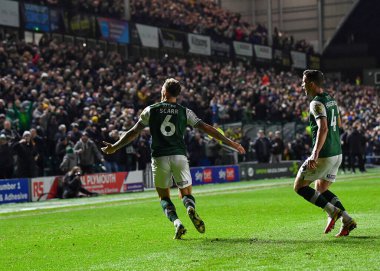 GoAL Plymouth Argyle defans oyuncusu Dan Scarr (6), 29 Aralık 202 tarihinde Home Park, Plymouth, İngiltere 'de oynanan Sky Bet League 1 karşılaşmasında 1-0' lık skorla Plymouth Argyle-Wycombe Wanderers karşılaşmasını kutluyor.