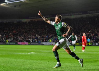 GoAL Plymouth Argyle defans oyuncusu Dan Scarr (6), 29 Aralık 202 tarihinde Home Park, Plymouth, İngiltere 'de oynanan Sky Bet League 1 karşılaşmasında 1-0' lık skorla Plymouth Argyle-Wycombe Wanderers karşılaşmasını kutluyor.