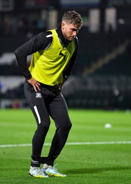 Plymouth Argyle defans oyuncusu Dan Scarr (6), 29 Aralık 202 'de İngiltere' nin Plymouth kentinde oynanan Sky Bet 1 karşılaşmasında Plymouth Argyle ve Wycombe Wanderers maçında ısındı.