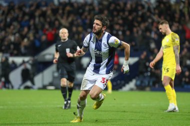 West Bromwich Albion 'dan 35 numaralı Yokulu, 29 Aralık 2022' de The Hawthorns, West Bromwich, İngiltere 'de oynanan West Bromwich Albion-Preston North End maçında 2-0 kazanma golünü kutluyor.