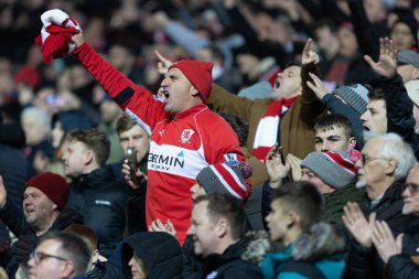 Middlesborough taraftarı 29 Aralık 202 'de Ewood Park, Blackburn, İngiltere' de oynanan Blackburn Rovers-Middlesbrough maçından sonra bunu kutluyor.