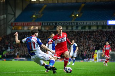 Blackburn Rovers 'dan Joseph Rankin-Costello # 11 Middlesborough' dan Riley McGree # 8 ile Blackburn Rovers - Middlesbrough maçında 29 Aralık 202 'de Ewood Park, Blackburn, İngiltere' de karşı karşıya geldi.