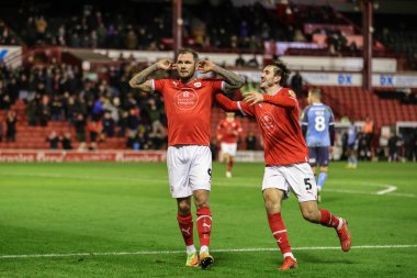 Barnsley 'den James Norwood # 9, 29 Aralık 202' de Oakwell, Barnsley, İngiltere 'de oynanan Sky Bet Lig 1 maçında 1-0' lık galibiyetini kutluyor.