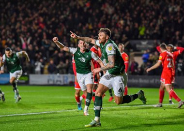 GoAL Plymouth Argyle defans oyuncusu Dan Scarr (6), 29 Aralık 202 tarihinde Home Park, Plymouth, İngiltere 'de oynanan Sky Bet League 1 karşılaşmasında 1-0' lık skorla Plymouth Argyle-Wycombe Wanderers karşılaşmasını kutluyor.