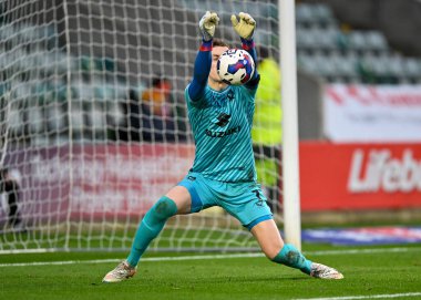 Milton Keynes Dons kalecisi Jamie Cumming (1), 1 Ocak 202 'de Home Park, Plymouth, İngiltere' de oynanan Sky Bet Lig 1 karşılaşmasında Plymouth Argyle 'a karşı MK Dons maçında bir kurtarış yaptı.