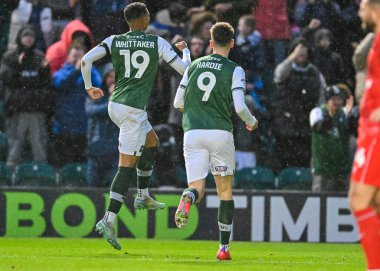 GOAL Plymouth Argyle forvet Morgan Whittaker (19) ve Plymouth Argyle forvet Ryan Hardie (9), Sky Bet 1 karşılaşmasında Plymouth Argyle 'ın Home Park, Plymouth, Birleşik Krallık 1 Ocak 202' de MK Dons 'a karşı oynadığı maçı 3-1 kazanma golünü kutluyor.