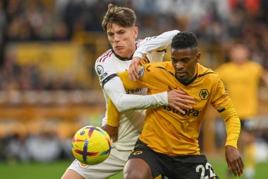 Manchester United 'dan Alejandro Garnacho ve Wolverhampton Wanderers' ın 22 numaralı oyuncusu Premier League maçında Wolverhampton Wanderers, Manchester United 'a karşı 31 Aralık 2022' de Molineux, Wolverhampton, Birleşik Krallık 'ta mücadele etti.