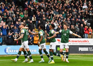 GoAL Plymouth Argyle defans oyuncusu James Wilson (5), 1 Ocak 202 'de Home Park, Plymouth, İngiltere' de oynanan Sky Bet Lig 1 karşılaşmasında takım arkadaşlarıyla 1-0 'lık bir gol attı.