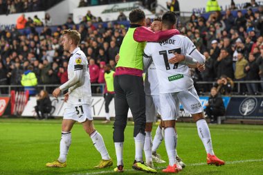 Swansea City 'den 17 numaralı Jol Piroe, 30 Aralık 2022' de Swansea.com Stadyumu 'nda oynanan Sky Bet Şampiyonası maçında 1-0' lık galibiyetini kutluyor.