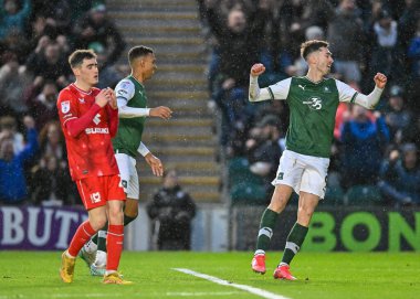 GOAL Plymouth Argyle forvet Morgan Whittaker (19) ve Plymouth Argyle forvet Ryan Hardie (9), Sky Bet 1 karşılaşmasında Plymouth Argyle 'ın Home Park, Plymouth, Birleşik Krallık 1 Ocak 202' de MK Dons 'a karşı oynadığı maçı 3-1 kazanma golünü kutluyor.