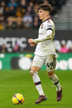 Manchester United 'ın 49 numaralı oyuncusu Alejandro Garnacho, 31 Aralık 202' de Molineux, Wolverhampton, Birleşik Krallık 'ta oynanan Premier Lig karşılaşmasında topa vuruyor.