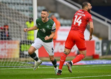 GoAL Plymouth Argyle defans oyuncusu James Wilson (5), 1 Ocak 202 'de Plymouth Argyle' ın Home Park, Plymouth 'ta MK Dons' a karşı oynadığı Sky Bet 1 maçında 1-0 berabere kalma golünü kutluyor.
