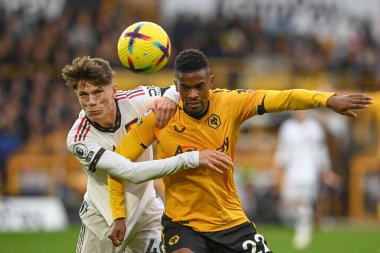 Manchester United 'dan Alejandro Garnacho ve Wolverhampton Wanderers' ın 22 numaralı oyuncusu Premier League maçında Wolverhampton Wanderers, Manchester United 'a karşı 31 Aralık 2022' de Molineux, Wolverhampton, Birleşik Krallık 'ta mücadele etti.