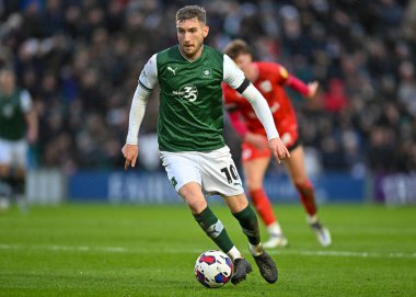 Plymouth Argyle orta saha oyuncusu Danny Mayor (10), 1 Ocak 202 'de İngiltere' nin Plymouth kentinde oynanan Sky Bet 1 karşılaşmasında MK Dons 'a karşı Plymouth maçında hücum etti.