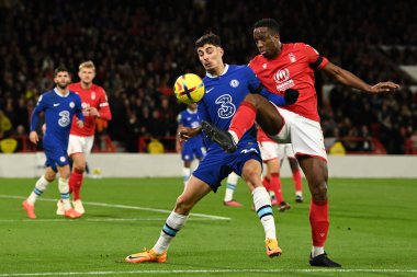 Kai Havertz #29 of Chelsea and Willy Boly #30 of Nottingham Forest challenge for the ball during the Premier League match Nottingham Forest vs Chelsea at City Ground, Nottingham, United Kingdom, 1st January 202 clipart