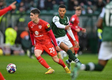 Plymouth Argyle forvet Morgan Whittaker (19), 1 Ocak 202 'de Home Park, Plymouth, İngiltere' de oynanan Sky Bet Lig 1 karşılaşmasında top için mücadele etti.