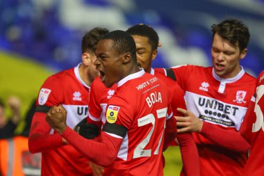 Middlesbrough 'dan 27 numaralı Marc Bola, Middlesbrough' un 29 numaralı Chuba Akpom 'u 2 Ocak 202' de St Andrews, Birmingham, Birmingham, İngiltere 'de oynanan Sky Bet Şampiyonası maçında 1-3' lük skorla kazandı.