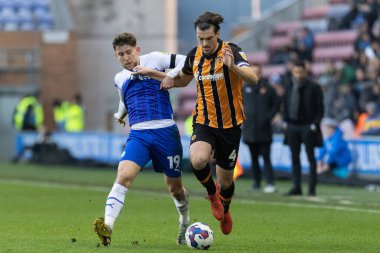 Hull City 'den Jacob Greaves 2 Ocak 202 tarihinde Wigan-Hull Stadyumu' nda oynanan Wigan Atletizm Şampiyonası maçında 4 numaralı formayı giydi.