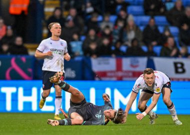 Plymouth Argyle orta saha oyuncusu Callum Wright (26), 7 Ocak 202 'de Bolton Stadyumu' nda oynanan Sky Bet 1 karşılaşmasında Bolton Wanderers - Plymouth Argyle maçında faul yaptı.
