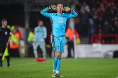 Dean Henderson #1 of Nottingham Forest celebrates saving a Rubn Neves penalty in the shootout during the Carabao Cup Quarter Final match Nottingham Forest vs Wolverhampton Wanderers at City Ground, Nottingham, United Kingdom, 11th January 2023