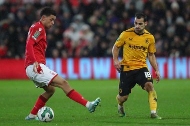 Brennan Johnson #20 of Nottingham Forest takes on Jonny #19 of Wolverhampton Wanderers during the Carabao Cup Quarter Final match Nottingham Forest vs Wolverhampton Wanderers at City Ground, Nottingham, United Kingdom, 11th January 202