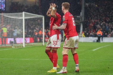 Renan Lodi #32 of Nottingham Forest and Jack Colback #8 of Nottingham Forest celebrate the victory after the Carabao Cup Quarter Final match Nottingham Forest vs Wolverhampton Wanderers at City Ground, Nottingham, United Kingdom, 11th January 202