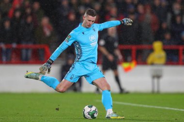 Dean Henderson #1 of Nottingham Forest clears the ball during the Carabao Cup Quarter Final match Nottingham Forest vs Wolverhampton Wanderers at City Ground, Nottingham, United Kingdom, 11th January 202