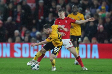 Ryan Yates #22 of Nottingham Forest fouls Joe Hodge #59 of Wolverhampton Wanderers during the Carabao Cup Quarter Final match Nottingham Forest vs Wolverhampton Wanderers at City Ground, Nottingham, United Kingdom, 11th January 202