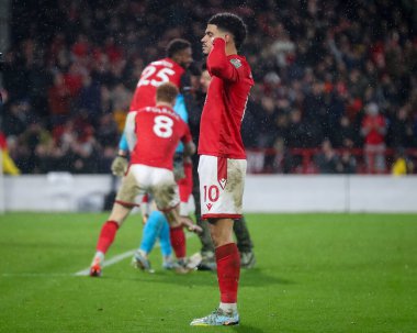 Morgan Gibbs-White #10 of Nottingham Forest puts his fingers in his ears and celebrates the victory after the Carabao Cup Quarter Final match Nottingham Forest vs Wolverhampton Wanderers at City Ground, Nottingham, United Kingdom, 11th January 202