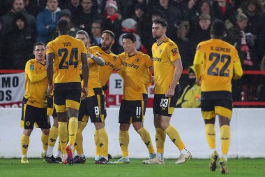 Ral Jimnez #9 of Wolverhampton Wanderers celebrates his goal with his team mates and makes the score 1-1 during the Carabao Cup Quarter Final match Nottingham Forest vs Wolverhampton Wanderers at City Ground, Nottingham, United Kingdom
