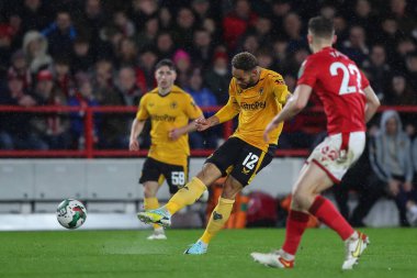 Matheus Cunha #12 of Wolverhampton Wanderers takes a shot during the Carabao Cup Quarter Final match Nottingham Forest vs Wolverhampton Wanderers at City Ground, Nottingham, United Kingdom, 11th January 202