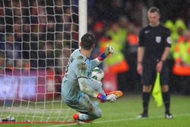 Jos S #1 of Wolverhampton Wanderers watches Remo Freuler #23 of Nottingham Forest penalty go in during the Carabao Cup Quarter Final match Nottingham Forest vs Wolverhampton Wanderers at City Ground, Nottingham, United Kingdom, 11th January 2023