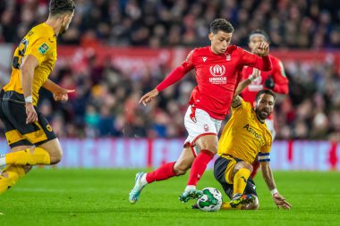 Brennan Johnson #20 of Nottingham Forest skips through a few Wolves challenges en route to goal during the Carabao Cup Quarter Final match Nottingham Forest vs Wolverhampton Wanderers at City Ground, Nottingham, United Kingdom, 11th January 202