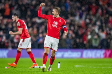 Joe Worrall #4 of Nottingham Forest celebrates after the conclusions of the penalty shootout during the Carabao Cup Quarter Final match Nottingham Forest vs Wolverhampton Wanderers at City Ground, Nottingham, United Kingdom, 11th January 202