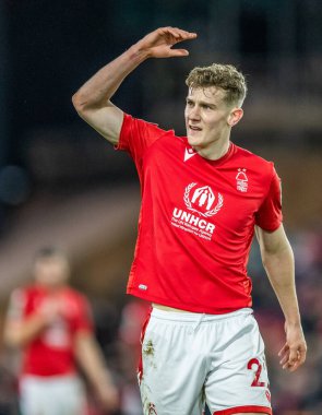 Ryan Yates #22 of Nottingham Forest urges the home crowd to get up during the Carabao Cup Quarter Final match Nottingham Forest vs Wolverhampton Wanderers at City Ground, Nottingham, United Kingdom, 11th January 202