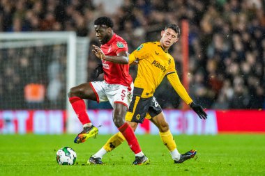 Orel Mangala #5 of Nottingham Forest skips past a challenge during the Carabao Cup Quarter Final match Nottingham Forest vs Wolverhampton Wanderers at City Ground, Nottingham, United Kingdom, 11th January 202