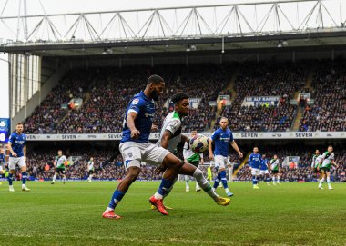 Plymouth Argyle forward Niall Ennis  (11) battles for the ball  during the Sky Bet League 1 match Ipswich Town vs Plymouth Argyle at Portman Road, Ipswich, United Kingdom, 14th January 202