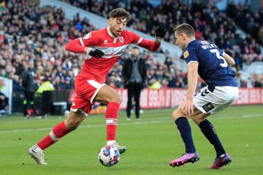 Matt Crooks #25 of Middlesbrough takes on Murray Wallace #3 of Millwall during the Sky Bet Championship match Middlesbrough vs Millwall at Riverside Stadium, Middlesbrough, United Kingdom, 14th January 202