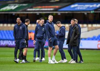 Plymouth Argyle players including Plymouth Argyle midfielder Sam Cosgrove (16) walks on and inspect the pitch  during the Sky Bet League 1 match Ipswich Town vs Plymouth Argyle at Portman Road, Ipswich, United Kingdom, 14th January 202