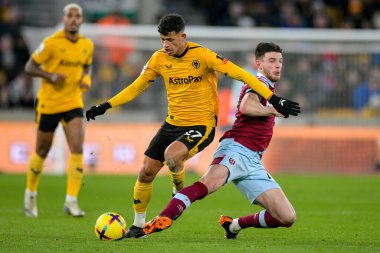 Matheus Nunes #27 of Wolverhampton Wanderers wins teh ball from Declan Rice #41 of West Ham United during the Premier League match Wolverhampton Wanderers vs West Ham United at Molineux, Wolverhampton, United Kingdom, 14th January 202