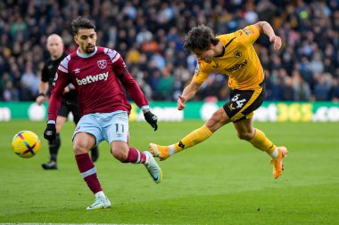 Hugo Bueno #64 of Wolverhampton Wanderers has a shot during the Premier League match Wolverhampton Wanderers vs West Ham United at Molineux, Wolverhampton, United Kingdom, 14th January 202