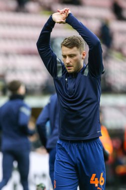 Tom Trybull #46 of Blackpool warms up during the Sky Bet Championship match Watford vs Blackpool at Vicarage Road, Watford, United Kingdom, 14th January 202