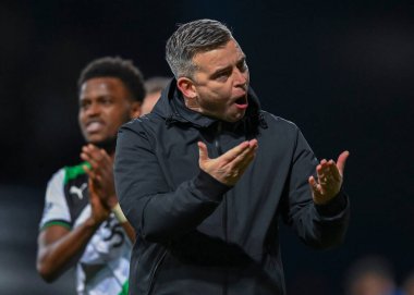 Plymouth Argyle Manager Steven Schumacher  celebrates at full time  during the Sky Bet League 1 match Ipswich Town vs Plymouth Argyle at Portman Road, Ipswich, United Kingdom, 14th January 202