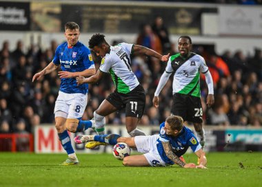 Ipswich Town defender Luke Woolfenden  (6) defensive sliding tackle and wins the ball form Plymouth Argyle forward Niall Ennis  (11)  during the Sky Bet League 1 match Ipswich Town vs Plymouth Argyle at Portman Road, Ipswich, United Kingdom, 14th Jan