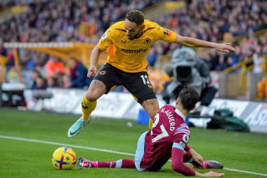 Matheus Cunha #12 of Wolverhampton Wanderers wins the ball from Nayef Aguerd #27 of West Ham Unitedduring the Premier League match Wolverhampton Wanderers vs West Ham United at Molineux, Wolverhampton, United Kingdom, 14th January 202