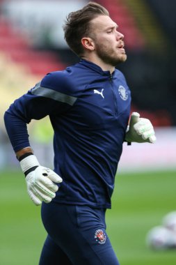 Chris Maxwell #1 of Blackpool warms up during the Sky Bet Championship match Watford vs Blackpool at Vicarage Road, Watford, United Kingdom, 14th January 202