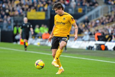 Hugo Bueno #64 of Wolverhampton Wanderers controls the ball during the Premier League match Wolverhampton Wanderers vs West Ham United at Molineux, Wolverhampton, United Kingdom, 14th January 202