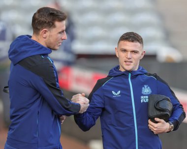 Chris Wood #20 of Newcastle United and Kieran Trippier #2 of Newcastle United shake hands as they arrive ahead of the Premier League match Newcastle United vs Fulham at St. James's Park, Newcastle, United Kingdom, 15th January 202